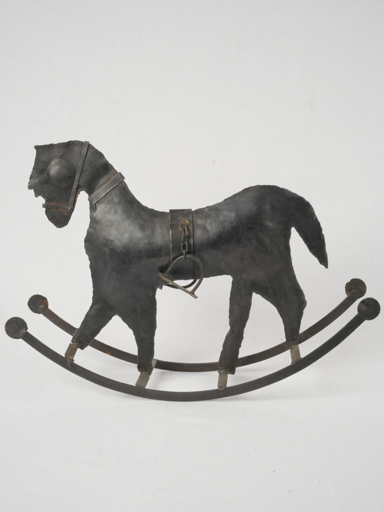 Dark patina stylized head piece