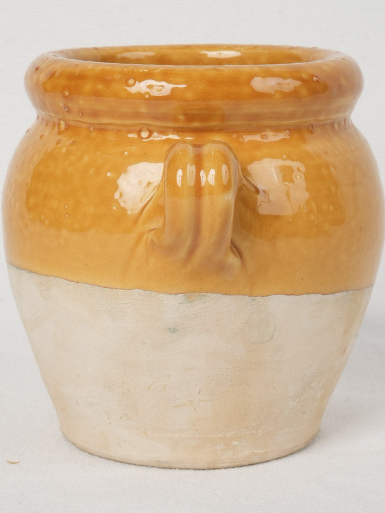 Vibrant ocher glazed French earthenware