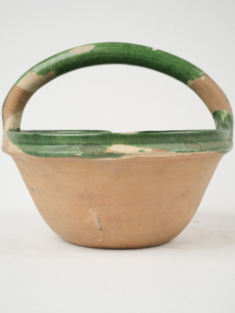 Aged terracotta French country kitchen pot