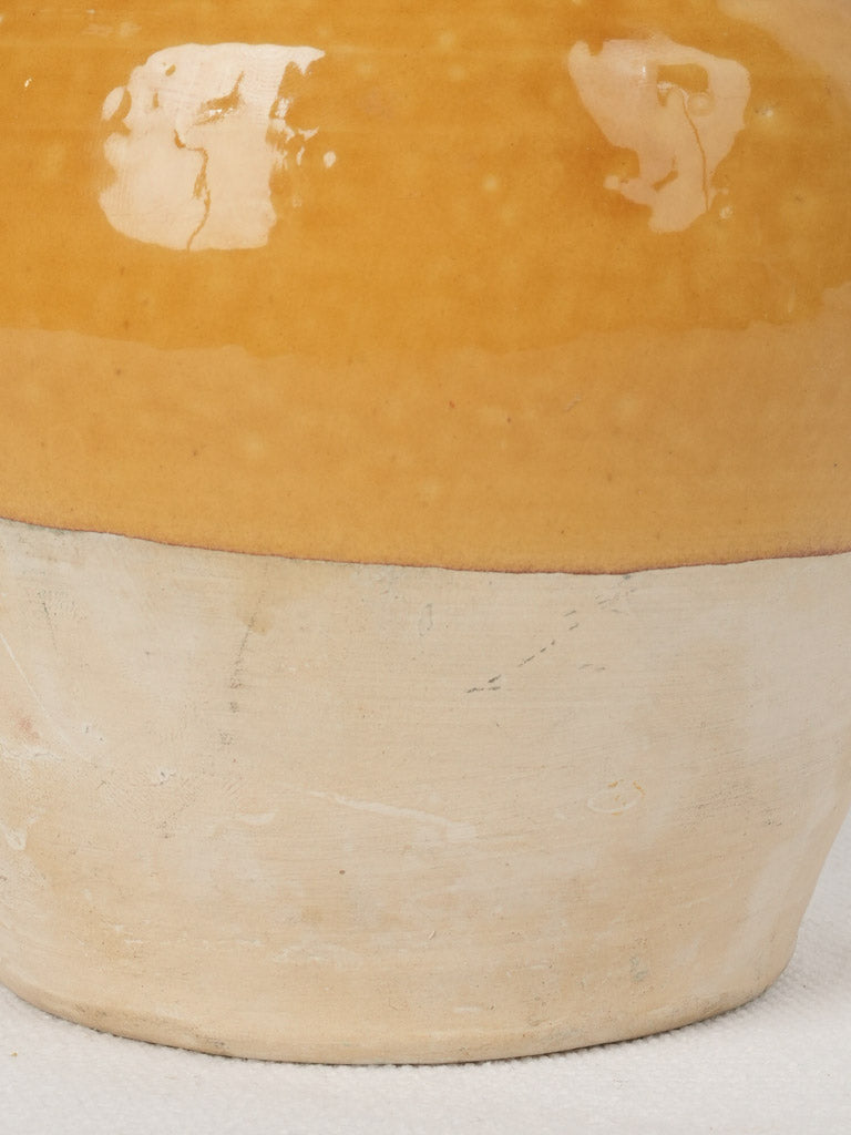 Graceful mid-century French ocher confit pot