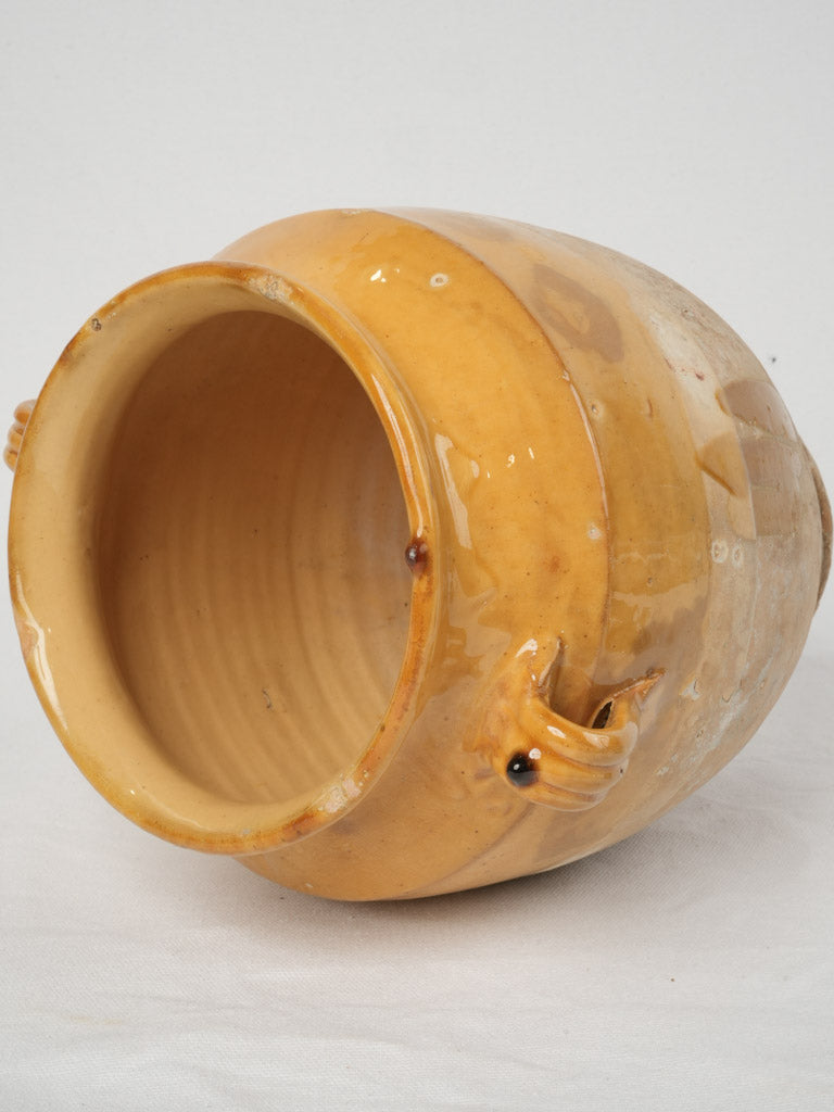 Aged ocher-glazed traditional French crock