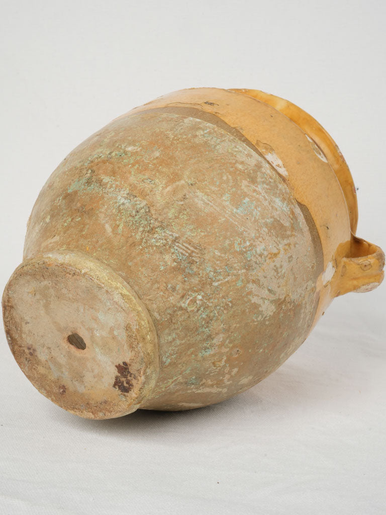 Rustic ocher-glazed antique French pot