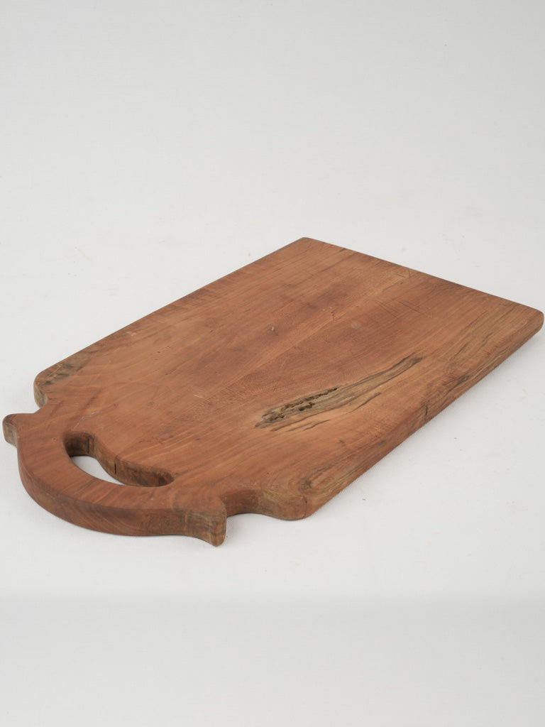 Antique arched handle cutting board