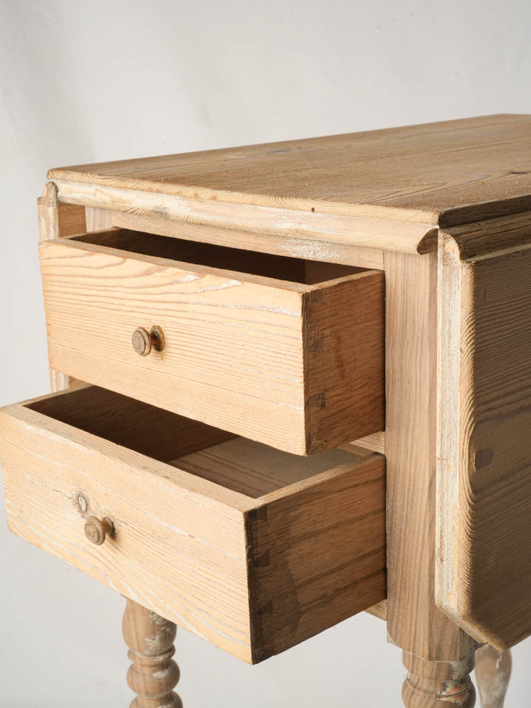 Elegant brass-caster bedside cabinet