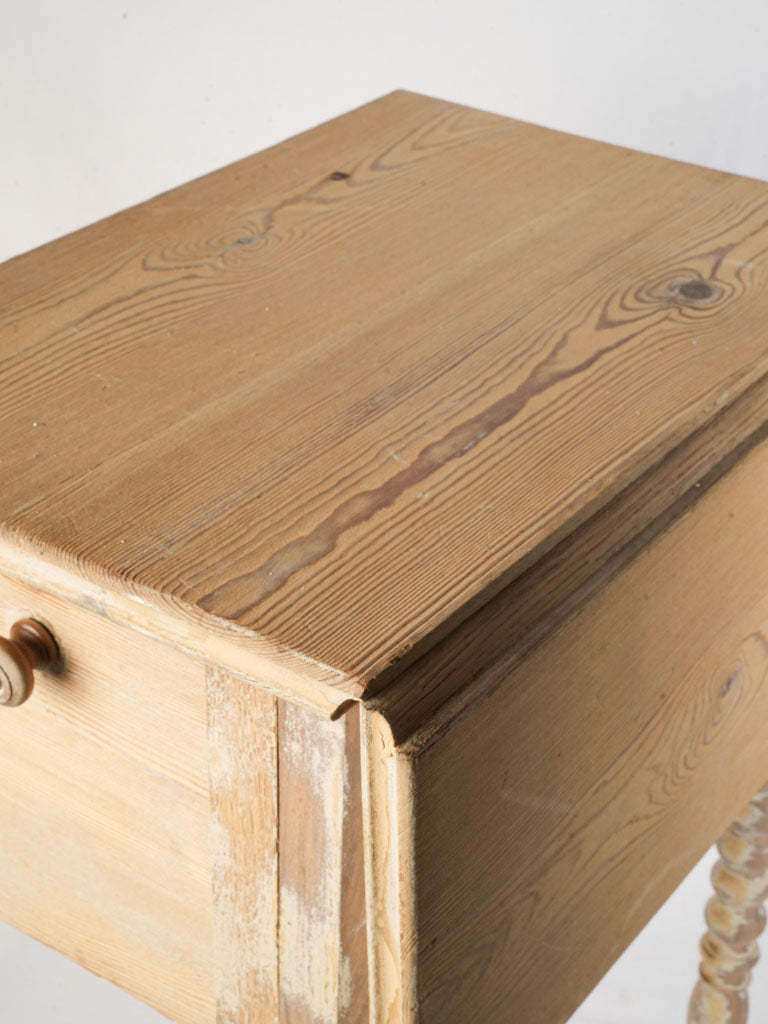 Vintage French utility nightstand on wheels