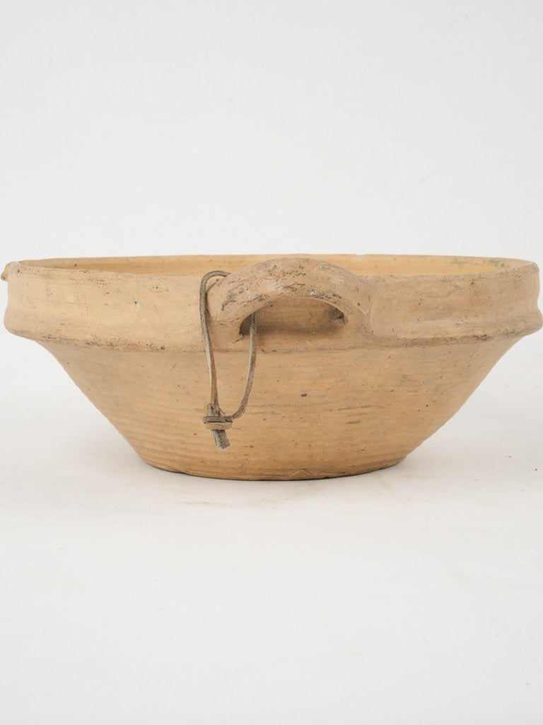 Charming aged clay fruit drainer