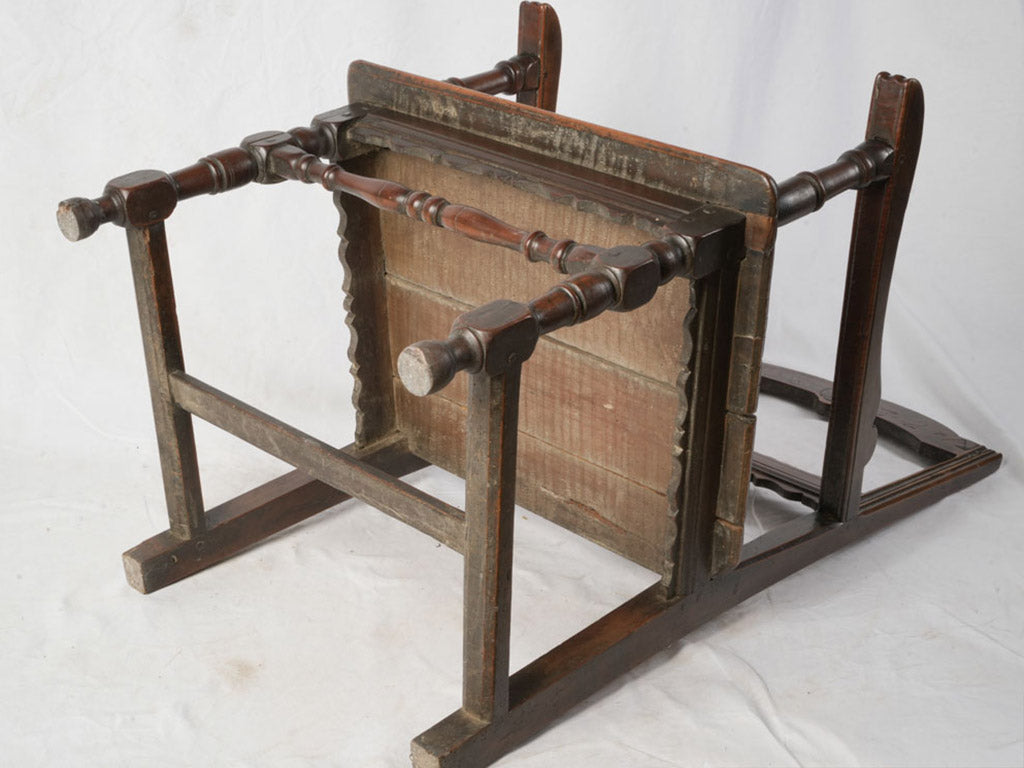 Soft-knuckled arms walnut armchair