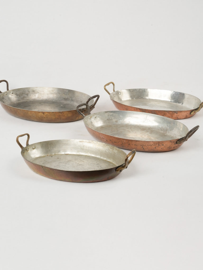 Charming French antique oval copper pans