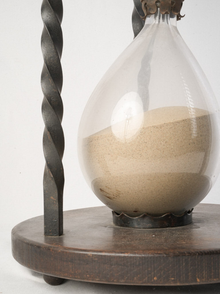 Eccentric sand-filled hourglass table