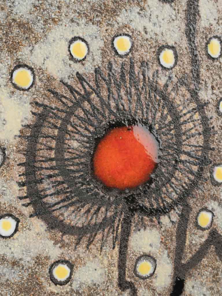 Textured earth-toned artwork