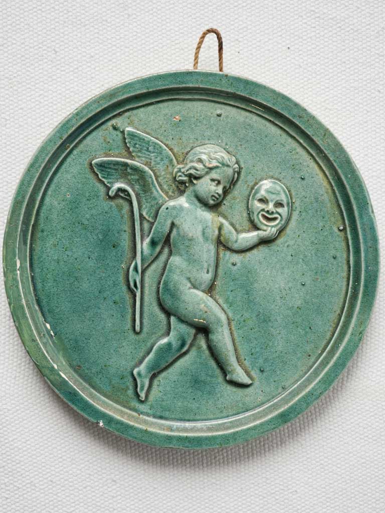Antique small circular ceramic medallion