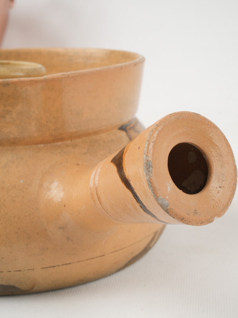 Traditional French terracotta milk guard