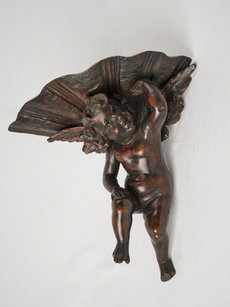 Whimsical 19th-Century Walnut Wall Bracket with Carved Cherub - 12¼"