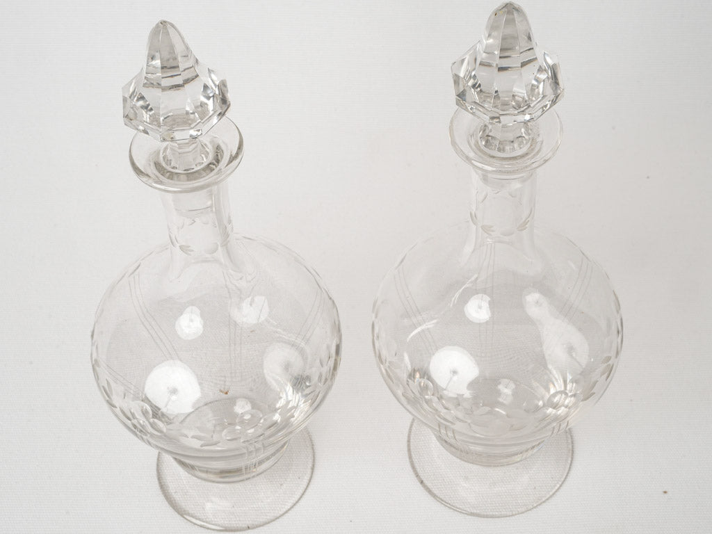 Opulent 1950s etched crystal carafes