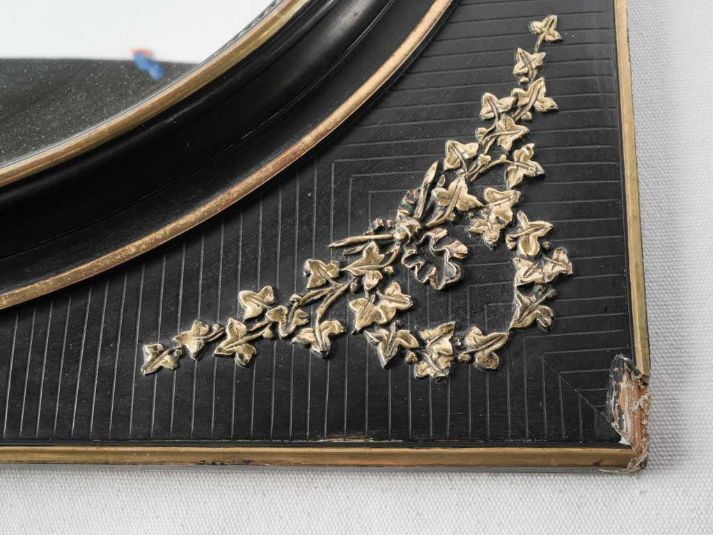Black lacquer giltwood mirror