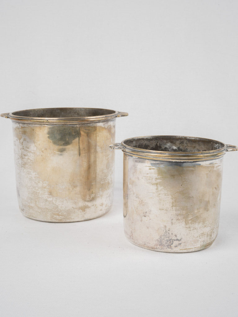 Antique timeworn silver-plated wine cooler