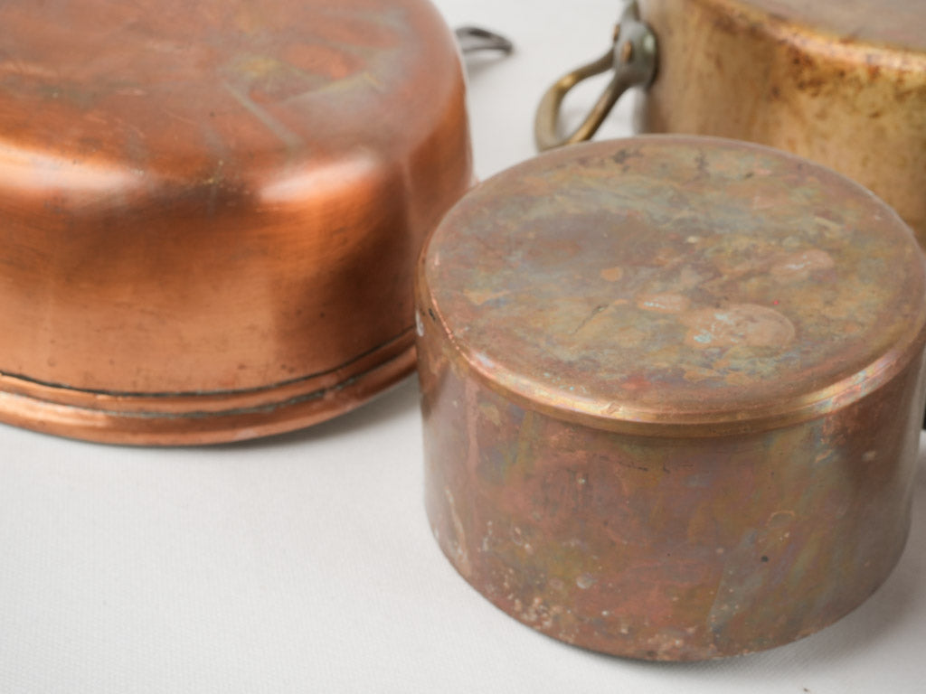 Antique copper saucepans from France