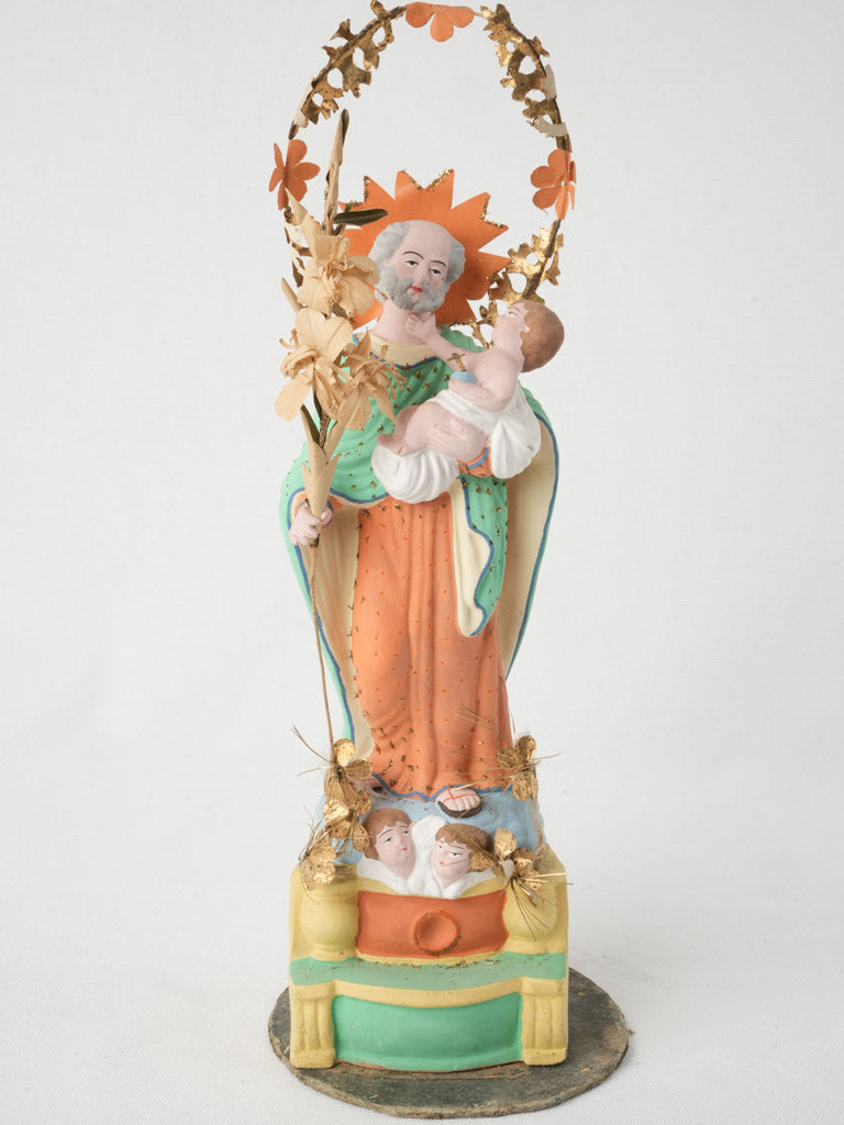 Antique vibrant terracotta statue