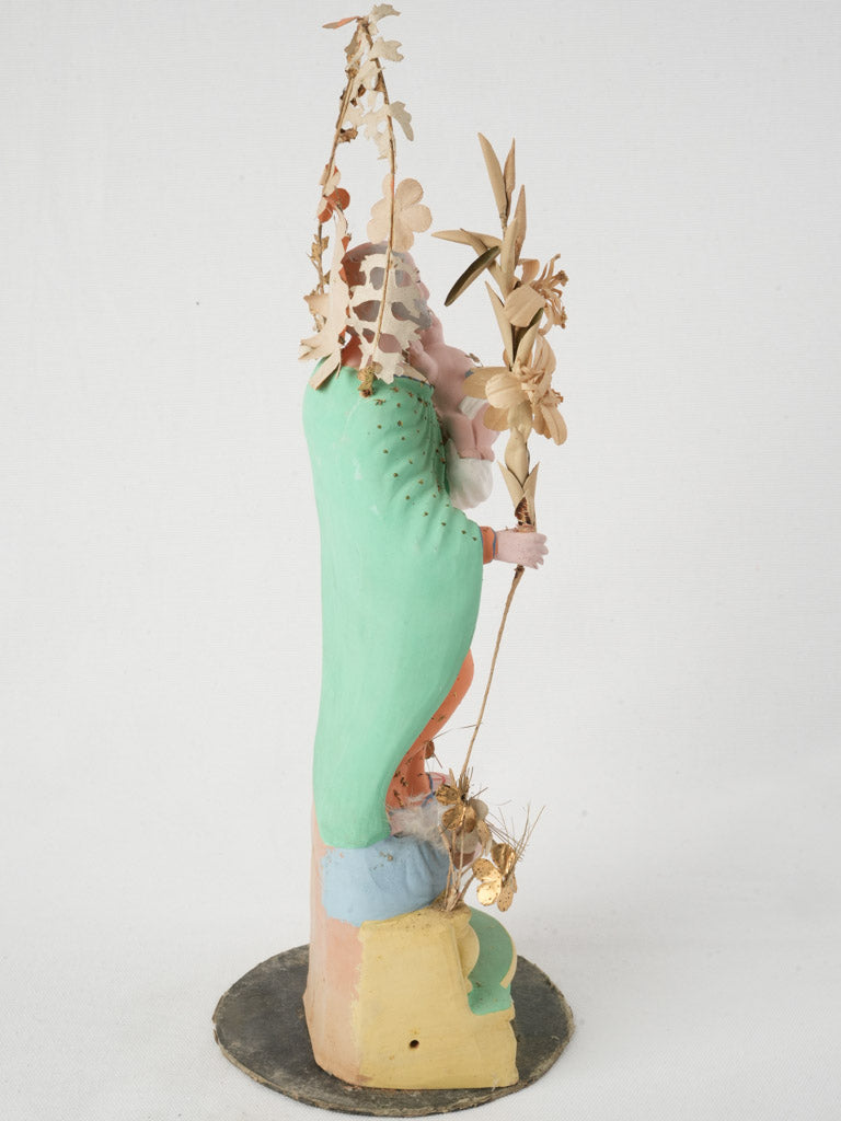 Golden embellished folk art piece