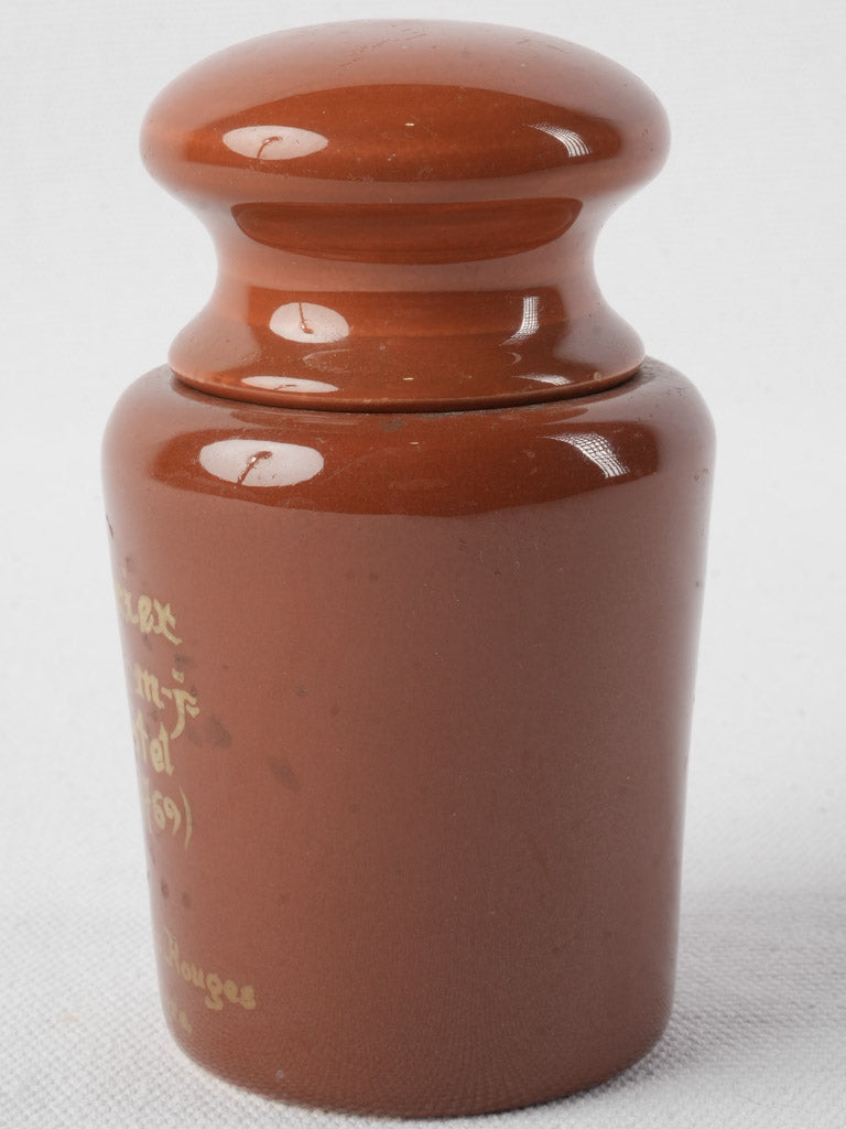 Caramel-colored artisanal mustard pot