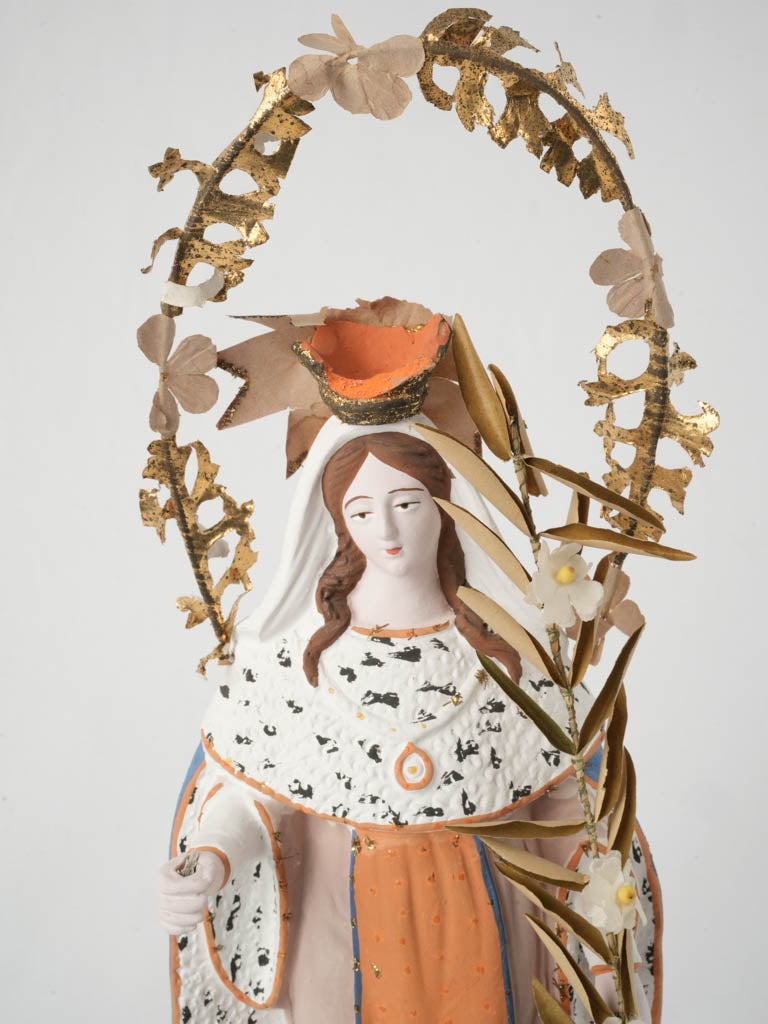 Serene Artistic Haloed Saint Figure