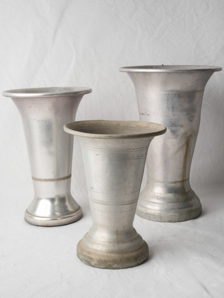 Elegant mid-century aluminum vases