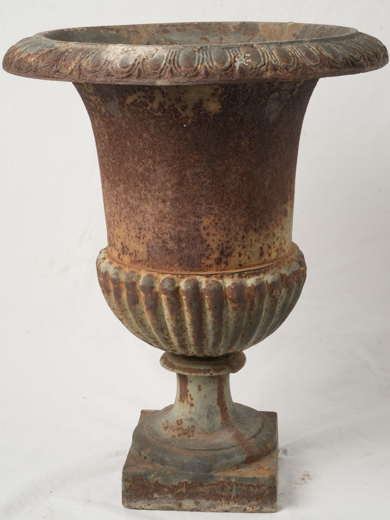 Intricate French garden urns