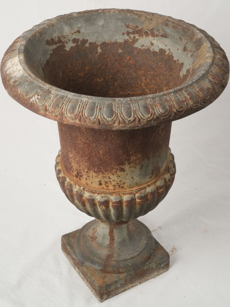 Aged decorative entryway urns