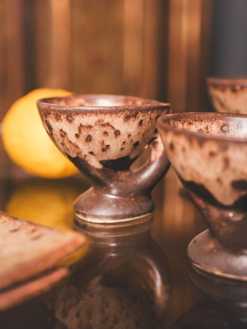 Earthy-tone glazed ceramic cups