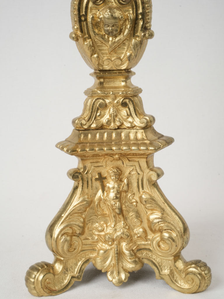 Patina-highlighted bronze altar candlestick
