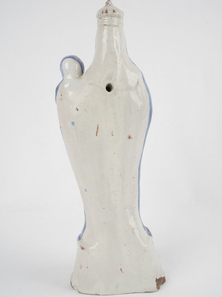 Ornate crowned Mother-and-Child ceramic artwork
