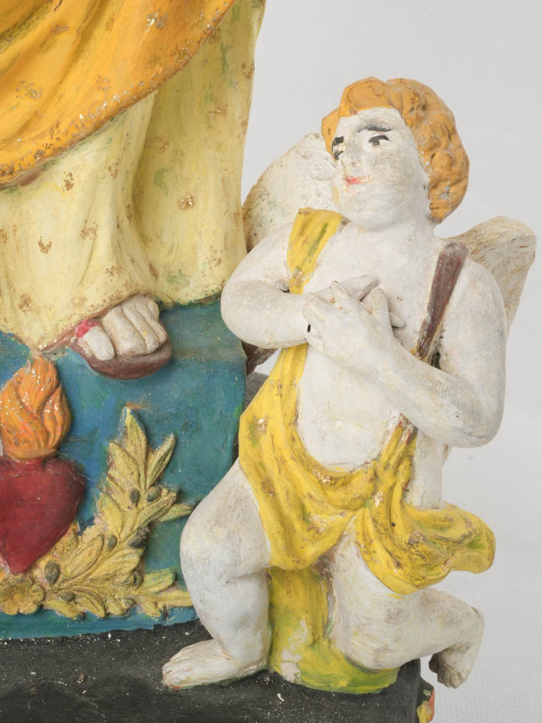 Historic cherub-adorned artifact