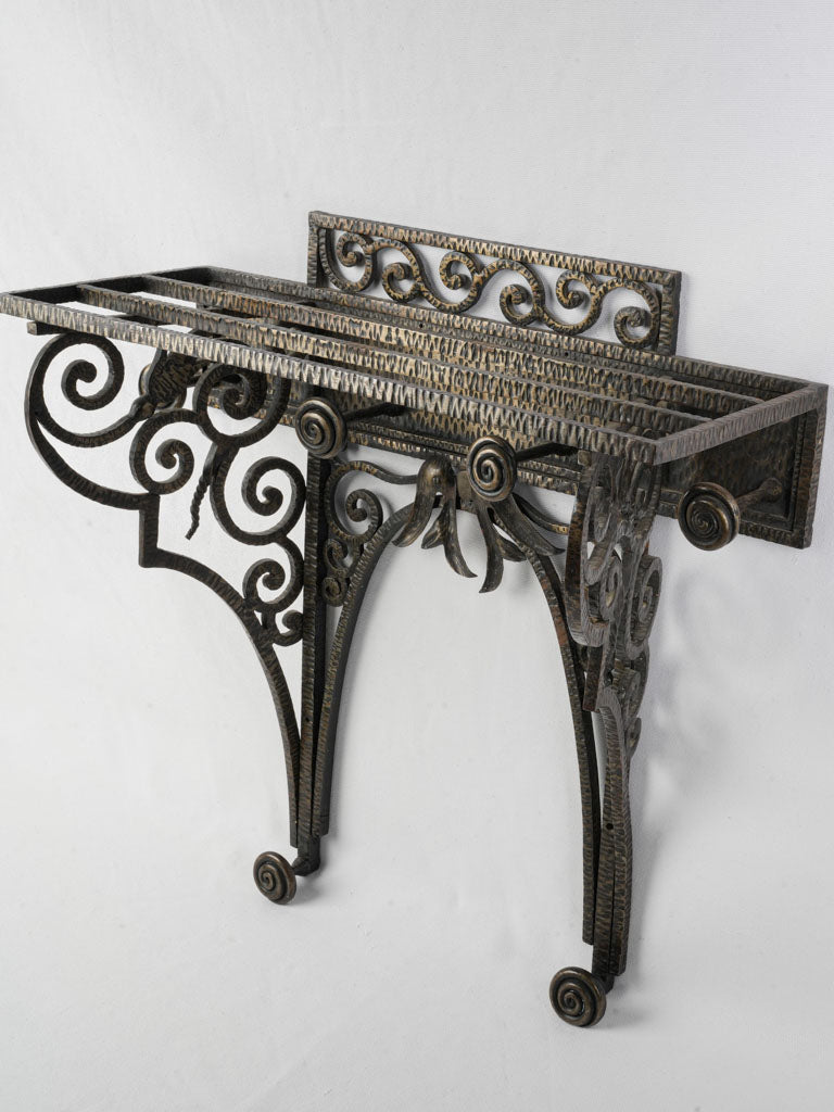 Antique hand-forged scrollwork coat rack
