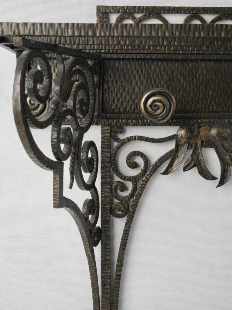 Sinuous volutes style metal hanger