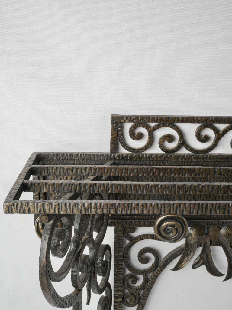 Decorative crest detailed coat rack