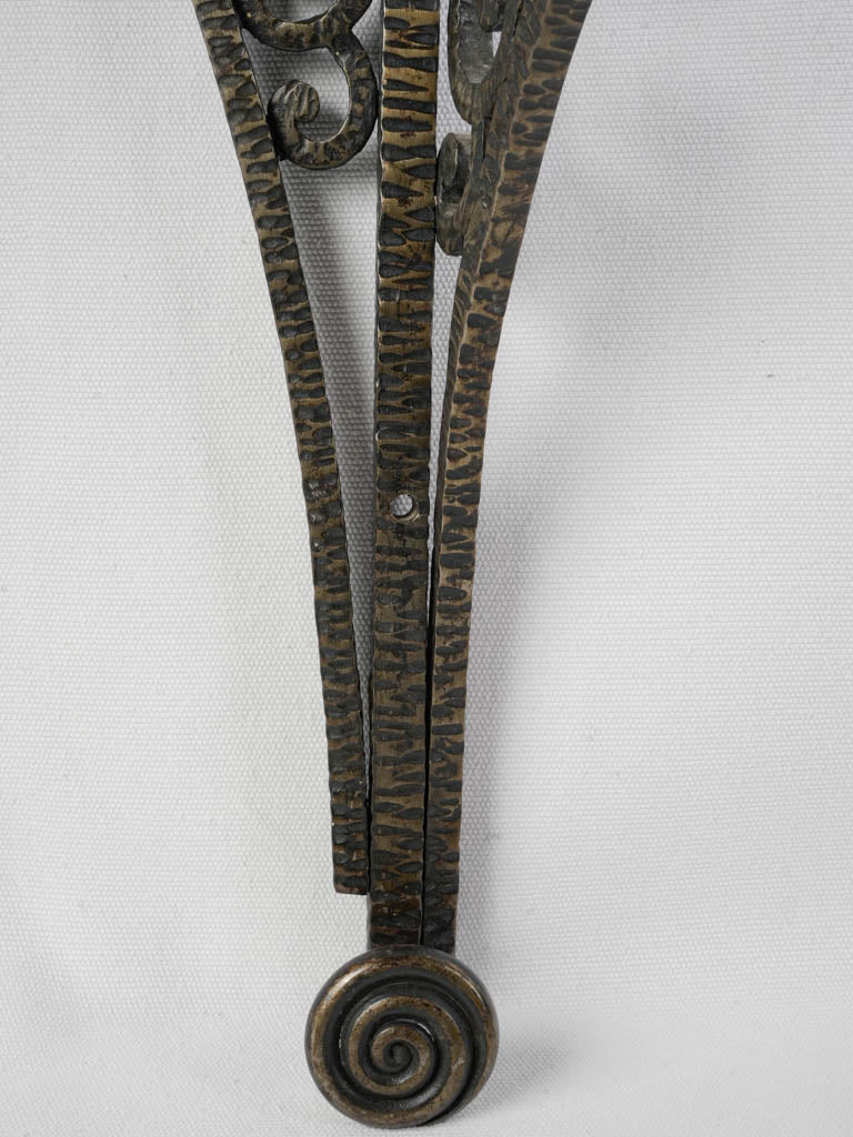 Patina-accented historical iron rack