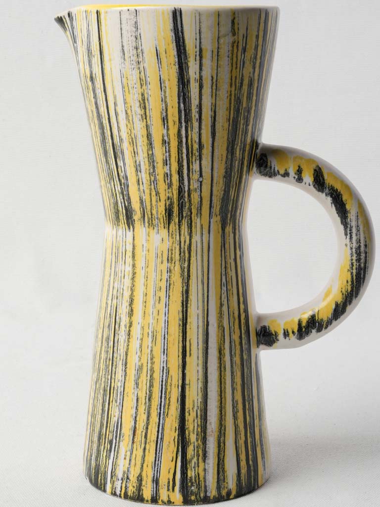 Handcrafted expressive surface pitcher