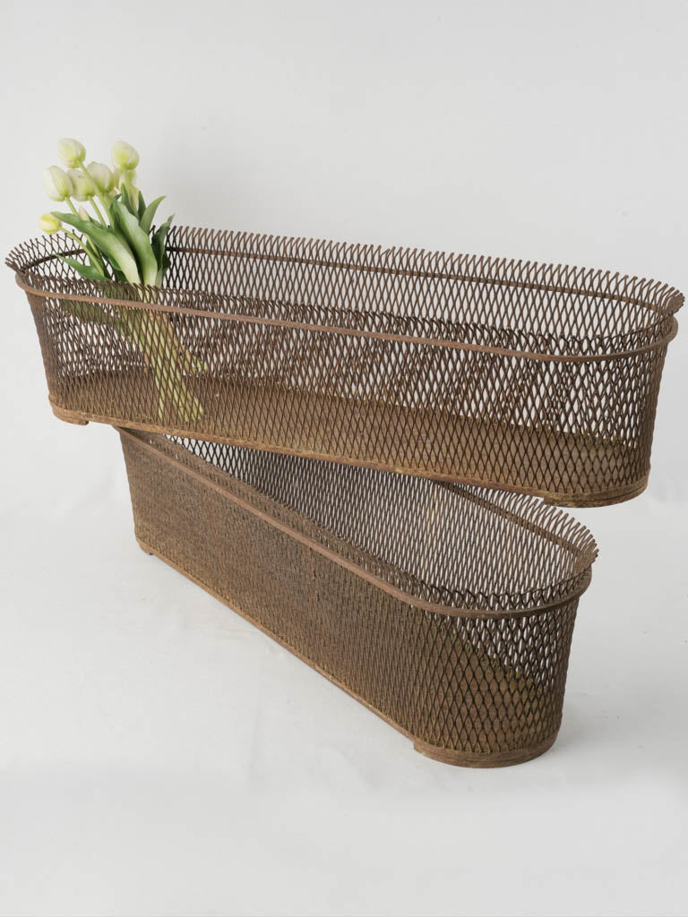 Patina-covered mid-century planters