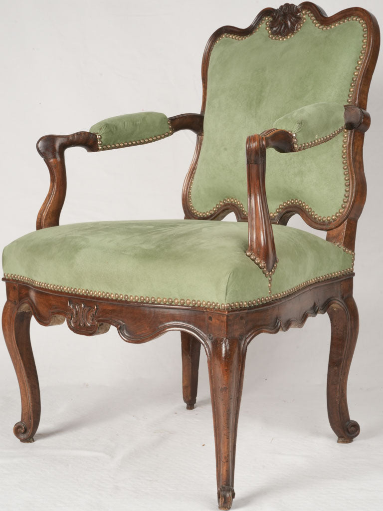 Graceful walnut Rococo-style armchair