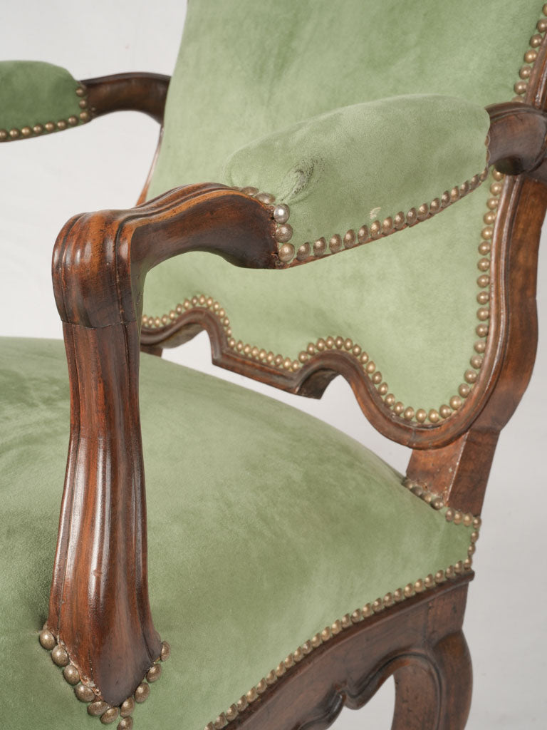 Refined green-upholstered armchair