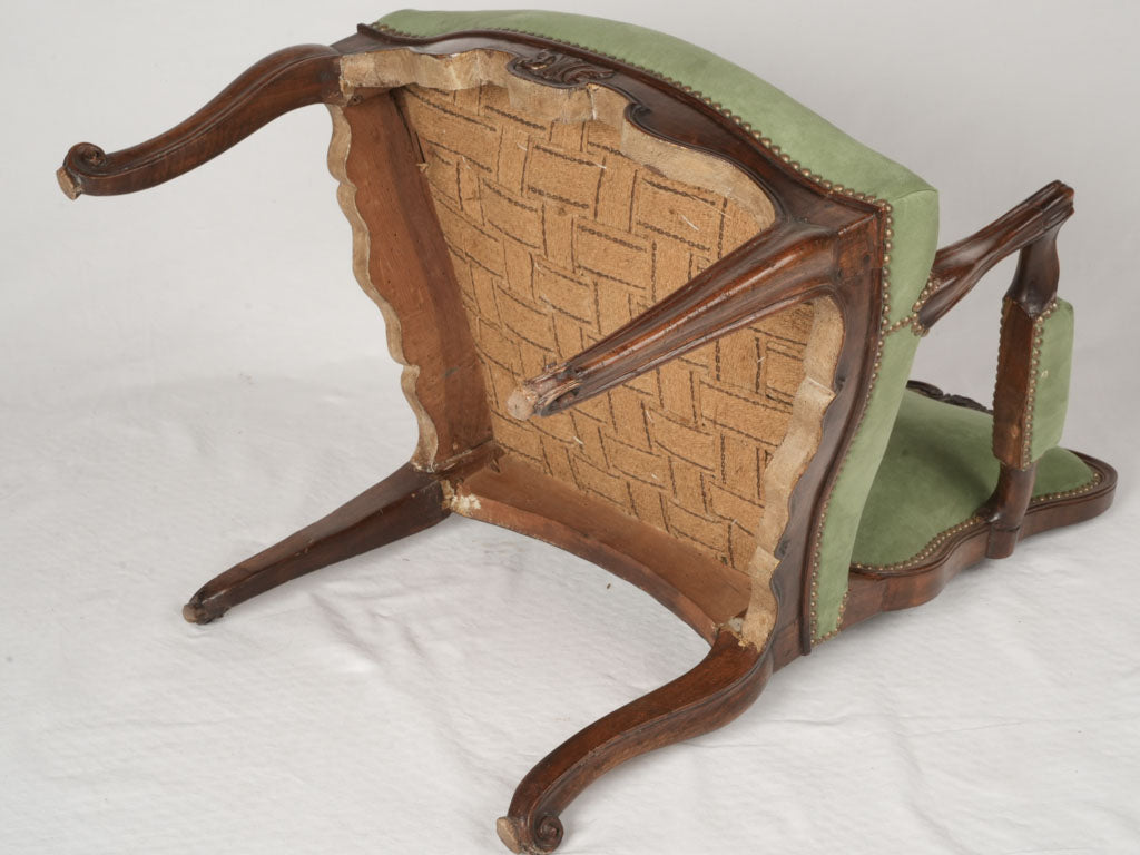 Artful walnut curvilinear armchair