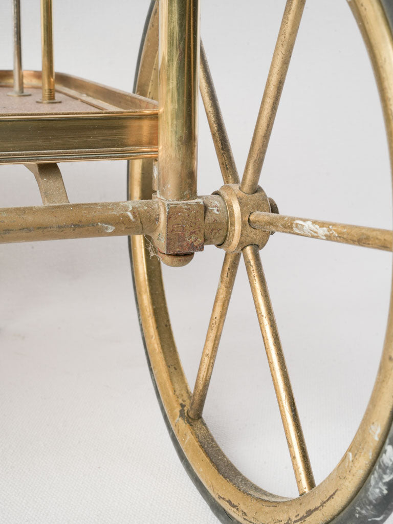 Warm-toned rosewood and brass cart