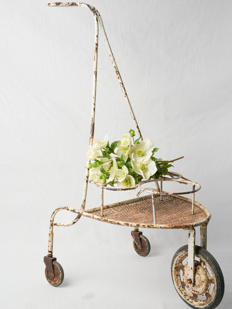 Charming vintage three-wheeled bar cart