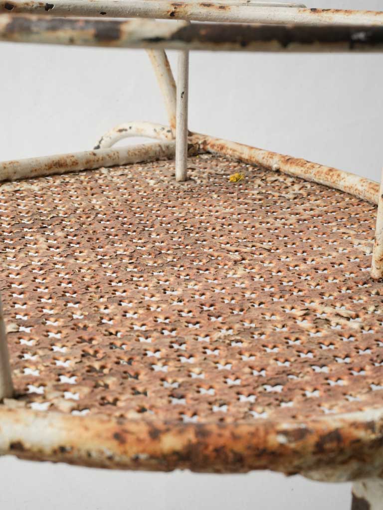 Sculptural wrought iron bottle holder