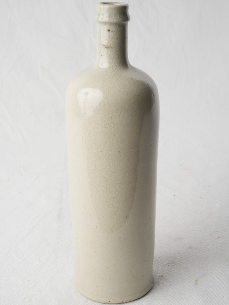 Antique off-white stoneware pot