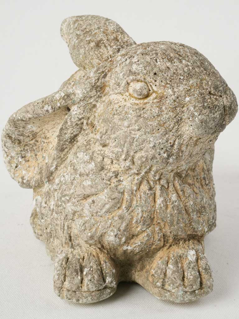 Rustic textured crouching rabbit figure