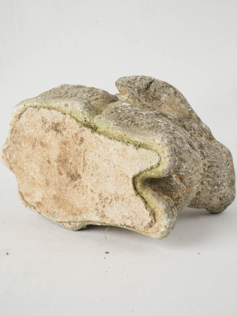 Textured revarnished stone sculpture