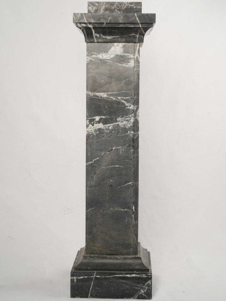 Richly veined marble display stand