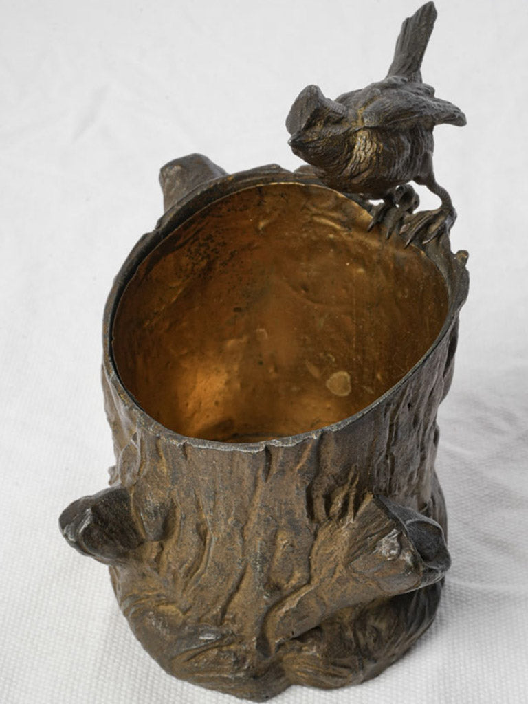 Patina-finished ornate match holder