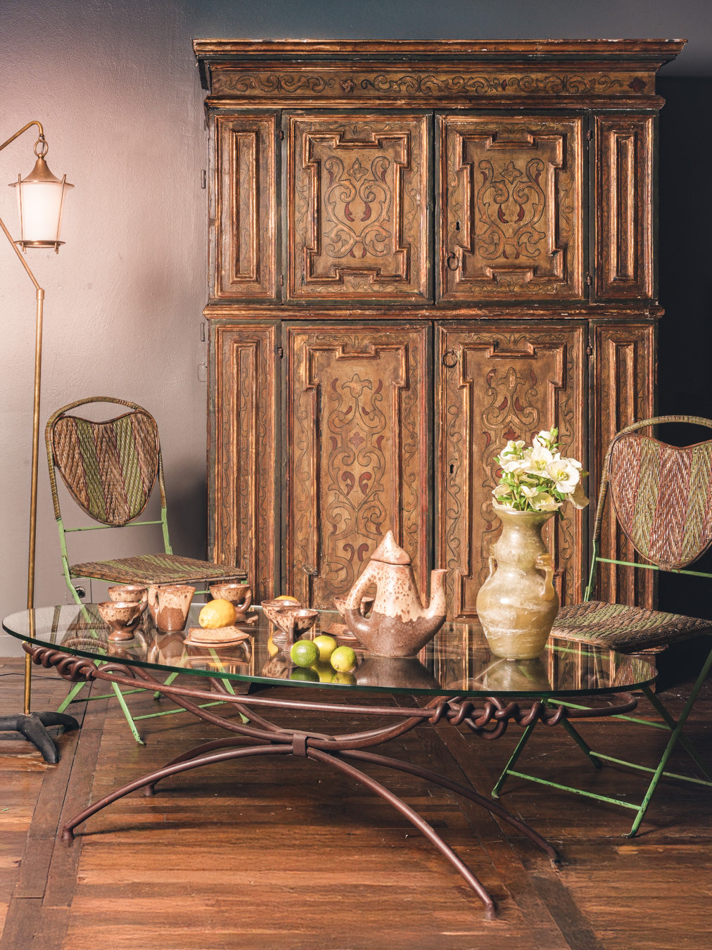 Rustic green-painted metal chairs set